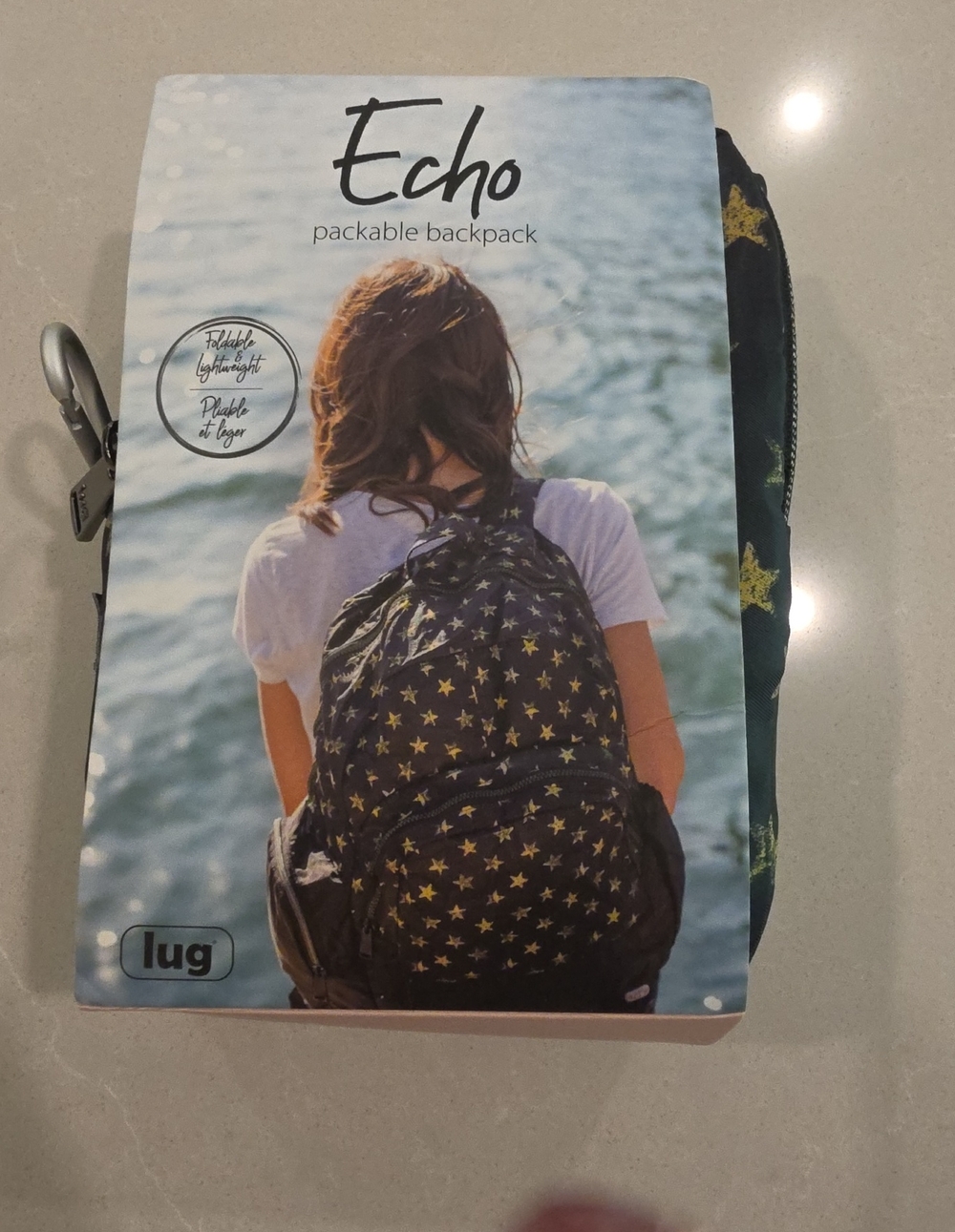 lug Black Packable Backpack with Gold Star Print